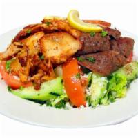 21. Gyros and Chicken Salad · Chicken kabob and gyros on house salad. served with pita bread. Halal.
