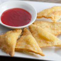 Crab Meat Cream Cheese Fried Wontons · Crispy fried wontons with Krab meat cream cheese filling, and house-made Sweet and Sour dipp...
