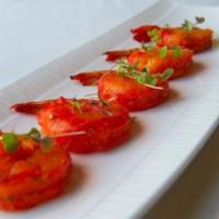 Shrimp Tandoori · Fresh, king size shrimp gently seasoned and slowly broiled over charcoal in the tandoor. 