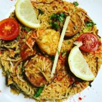 Chef Special Biryani · Special imported basmati rice cooked with chicken, lamb, shrimp cashew nuts, golden raisins,...