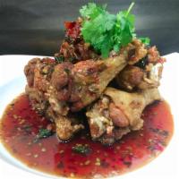Spicy Wings · Fried chicken wings with house sauce