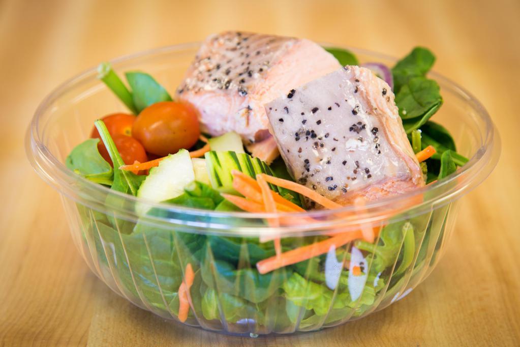 Salmon Salad · Served with fresh spinach with red onions, cucumber, cherry tomatoes and matchstick carrots.