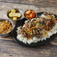 Bulkogii Platter · Bulkogii (marinated rib-eye) served with rice and 3 Korean side dishes.