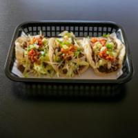 Spicy Pork Tacos · 3 Corn tortilla tacos with spicy pork, cheese, lettuce, kimchi, green onions, spicy mayo and...