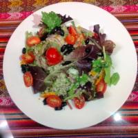 42. Quinoa Salad · Cherry tomatoes, choclo, mint, cucumbers, celery, onion, kale and quinoa.