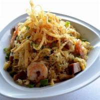 Arroz Chaufa Capon · Traditional Peruvian-Chinese-style fried rice with oven roasted oriental pork, chicken, shri...
