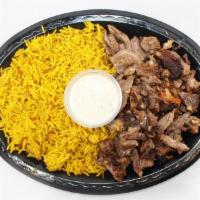 Beef Shawarma  · Sliced marinated Beef in House Speice Serves with a Choice of Basmati Biryani Rice, French F...