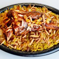 Lamb Quozi Platter · Lamb Shank marinated in our special House Spices, serves with Basmati Biryani Rice comes wit...