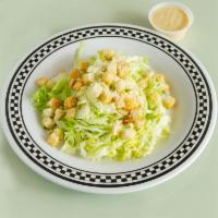 Caesar Salad · Lettuce, Romano cheese, croutons and Caesar dressing.