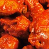 12 Pieces Wings · Freshly fried chicken wings with your choice of our homemade sauce (Buffalo, Honey BBQ, Smok...