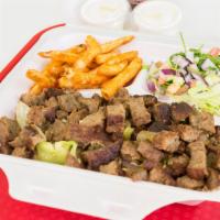 Lamb Over Rice Platter · Served with mixed salad and choice of fries or hummus.