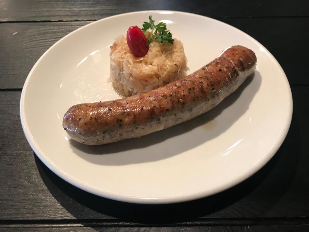 Kielbasa · Delicious Polish smoked sausage, grilled & served with a side of sauerkraut stew & potato salad