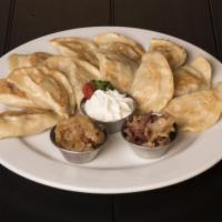 6 Sweet Pierogi Plate · Pierogi made from high gluten flour, eggs, sour cream.  Served boiled, covered with powdered...