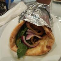 Veggie Gyro · With grilled vegetables. Pita with lettuce, tomato, onion and tzatziki.