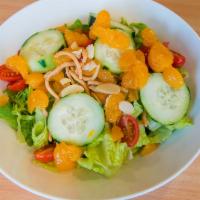 Oriental Mardarin Salad · Mandarin oranges, tomatoes, cucumbers, crispy rice noodles, sliced almonds and romaine with ...