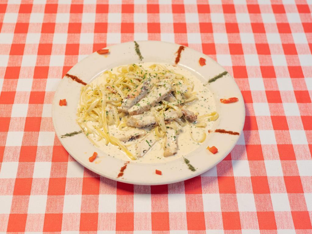 Fettuccini Alfredo · Fettuccine noodles in our luscious Alfredo sauce. Add grilled chicken to make it even tastier!