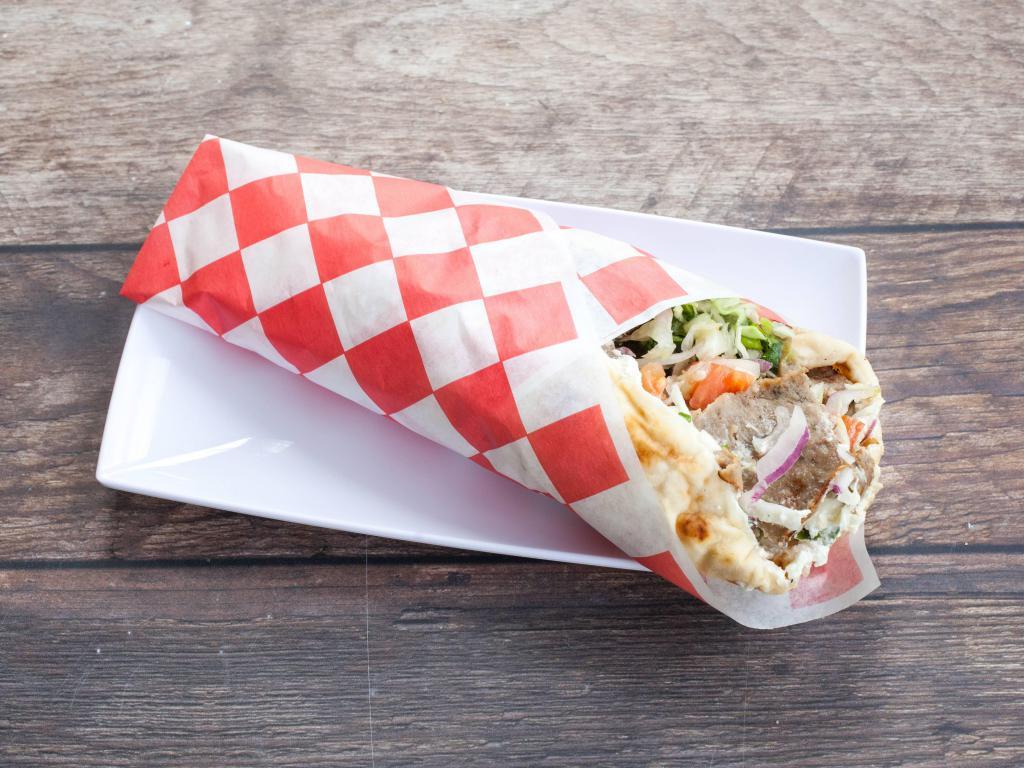 Super Gyro Sandwich · Served with extra Lamb & Beef,  hummus, Tzatziki, Feta Cheese, lettuce, cucumber, cabbage, tomato, and onions.