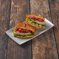Richard's Dagwood Sandwich · Turkey, bacon, avocado, mayo, lettuce, tomato, onion, cheddar and on toasted sweet French ro...