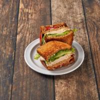 Turkey Club Sandwich · Turkey, bacon, mayo, lettuce, tomato on 3 slices of toasted whole wheat bread.