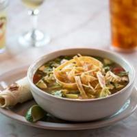 Tortilla Soup · Tortilla strips, tomatoes and onions. Served with garlic bread.