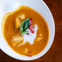 Pineapple Curry · Pineapple in classic red curry with red bell pepper and basil.