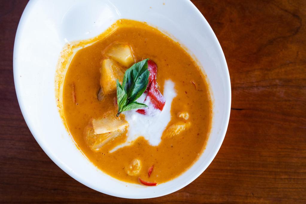 Pineapple Curry · Pineapple in classic red curry with red bell pepper and basil.