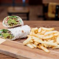 Jerusalem Falafel Sandwich · traditional falafel sandwich + Layla's famous homemade fries. Served on toasted wrap or fluf...