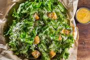 Caesar Salad · Crisp green leaf lettuce, shredded Parmesan cheese, croutons and creamy Caesar dressing.