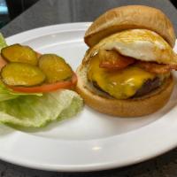 Texan Burger / Hamburguesa Texana · Bacon, American cheese, lettuce, tomato, onion, and egg. / Tocino, Queso Americano, Lechuga,...