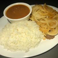 Bistec Encebollado · Served with a choice of tostones, fries, tots, rice & beans or yellow rice & black beans.