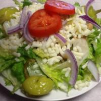 House Italian Salad · Chopped fresh romaine, mozzarella cheese, garbanzo beans, red onion and tomato. Pepperoncini...