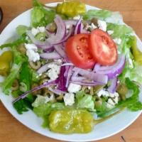 Greek Salad · Chopped fresh romaine, green olive, pepperoncini, feta cheese, red onion and tomato.