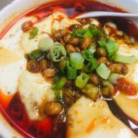 A18. Tender Tofu with Sichuan Pickles · Spicy.