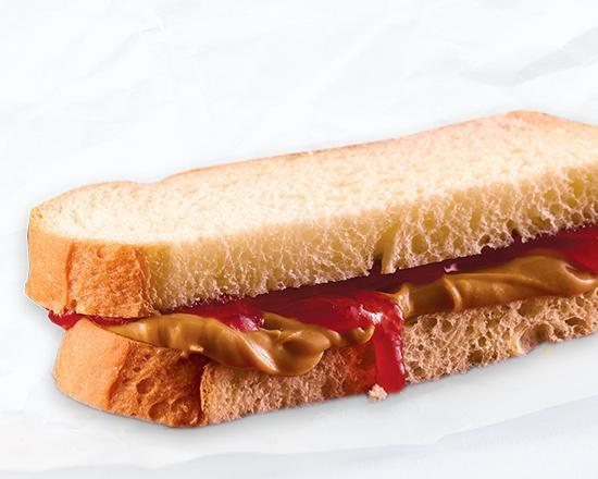 Kids Sandwich · Choice of PB&J, Ham, Turkey, or Grilled Cheese on either white or harvest bread. Served with bakery chips or baby carrots. Served with your choice of fresh fruit or a freshly baked cookie and milk, 12 oz soft drink, or kids' juice.