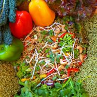 Vegan Spicy Super Green Ramen Salad · Organic mixed greens, spicy super green noodles, organic bean sprouts, organic edamame, bell...