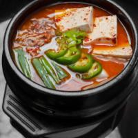 Tuna Kimchi Soup · Tuna kimchi stew with vegetables, potatoes, tofu & onions.