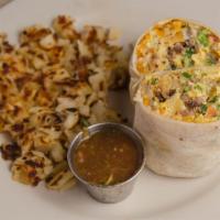 Lulu's Breakfast Burrito · (Our most popular) Smoked ham, sausage, bacon, eggs, potatoes, cheeses on a 12 inch flour to...