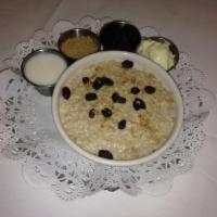 Oatmeal · With milk, butter, raisins and brown sugar.