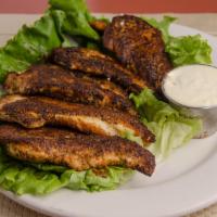 Cajun Chicken Tenders · Flame grilled chicken breast tenders, Cajun spices and house dipping sauce.
