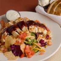 BBQ Chicken Salad · Iceberg mix, grilled chicken, cheese, tomatoes, tortilla chips, BBQ sauce and house dressing...