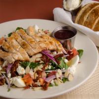 Chicken Spinach Salad · Fresh spinach, grilled chicken, hard boiled egg, feta cheese, fresh tomatoes, sun-dried toma...