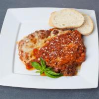 Veal Parmigiana · Traditional Italian veal specialty baked with mozzarella cheese and marinara sauce.