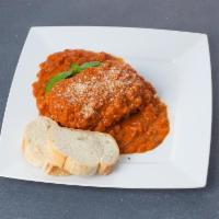 Meat Lasagna · Served with creamy tomato sauce.