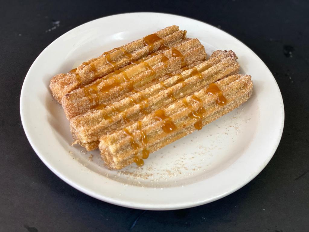 Churros · Deep fried dough sticks covered in cinnamon powdered and sugar.