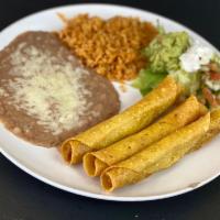 Taquitos · 3 corn tortillas, stuffed with chicken and fried until crispy. Served on a bed of lettuce an...