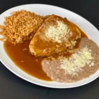 Chile Relleno · A poblano chile, stuffed with jack cheese, dipped in an egg batter and simmered in a tomato ...