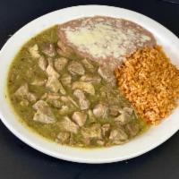 Chile Verde · Chunks of pork simmered in a flavorful green tomatillo sauce. Served with rice,