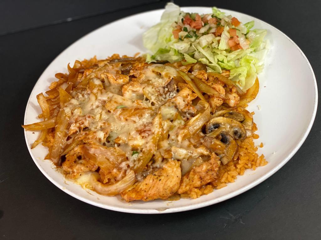 Arroz con Pollo · Chunks of chicken simmered in our special salsa with mushrooms, served on a bed of rice and cheese. Not served with beans. Served with rice, shredded lettuce, tomato, and onion.