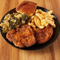 2 Pieces Fried Pork Chops · Includes 2 sides and a side bread.