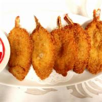 5. Butterfly Shrimp · 5 pieces of jumbo battered golden fried shrimp served with sweet and sour sauce.